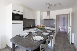 Appartements Au Quai Des Pecheurs by Cocoonr : photos des chambres