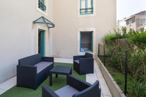 Appartements Au Quai Des Pecheurs by Cocoonr : photos des chambres