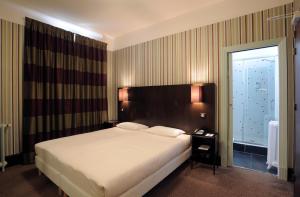 Hotels Le Grand Hotel : photos des chambres