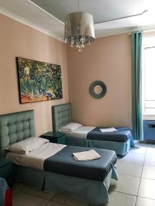 Bed in 4-Bed Mixed Dormitory Room room in Palladini Hostel Rome