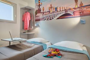Hotels Welcomotel Les Mureaux : photos des chambres