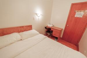 Standard Double (No Window) room in U.S. Pacific Hotel