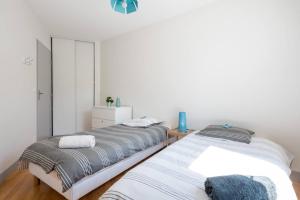 Appartements 19Sisley - Calme & Cosy - 3CH 8P Metro Parking x2 : photos des chambres