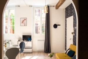 Appartements La Dame du Taur by Cocoonr : photos des chambres