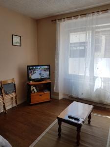 Appartements Le petit Courcy : photos des chambres