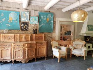 Hotels Hotel Sous les Figuiers : photos des chambres