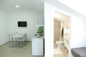 Apartmani "ROSHU"