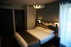 Hotels Hotel Saint-Roch, The Originals Relais : photos des chambres