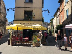Appartements Aux pieds des arenes : photos des chambres