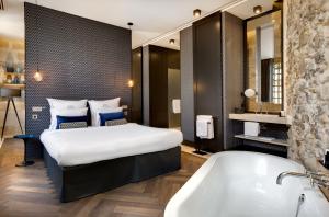 Hotels Boutique Hotel des Remparts & Spa : photos des chambres