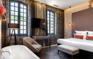 Hotels Boutique Hotel des Remparts & Spa : photos des chambres