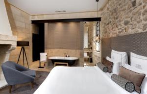 Hotels Boutique Hotel des Remparts & Spa : photos des chambres