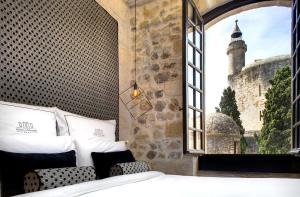 Hotels Boutique Hotel des Remparts & Spa : photos des chambres