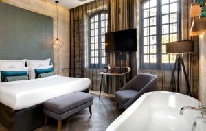 Hotels Boutique Hotel des Remparts & Spa : photos des chambres