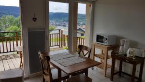 Appartements F2 SUR LES HAUTEURS DE GERARDMER : photos des chambres