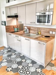 Appartements Homelivia, Appart FRIDA, mezzanine, deco raffinee et balcon : photos des chambres