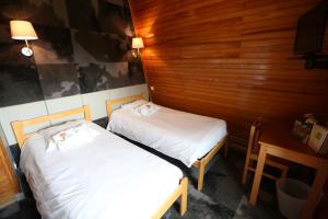 Hotels Gite-Hotel Le P'tit Cham : photos des chambres