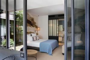 Hotels Hotel Les Deux Girafes : photos des chambres