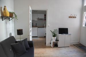 Appartements L'authentique - Coeur de ville : photos des chambres