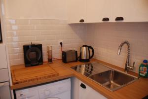 Appartements L'authentique - Coeur de ville : photos des chambres