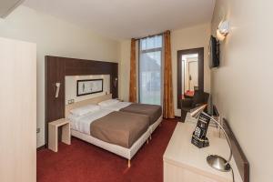 Hotels Hostellerie Saint Vincent Beauvais Aeroport : photos des chambres