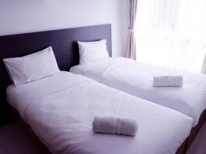 Simply 1BR Scientia Residence Apartement near Summarecon Mall Gading Serpong By Travelio - Kramat