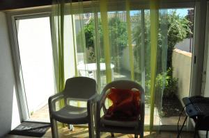 Maisons de vacances Pavillon des Loritz : photos des chambres