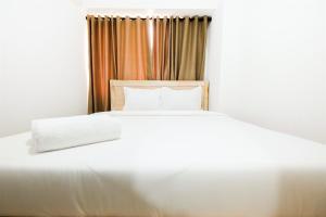 Comfortable 2BR at Bassura Apartment Near to Bassura City Mall By Travelio