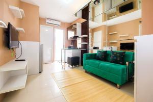 Luxurious 2BR Bassura City Apartment with Mall Access By Travelio