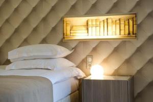 Hotels Art'Hotel & SPA Le Potin Gourmand : photos des chambres