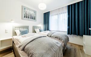 Deluxe One-Bedroom Apartment room in Apartamenty Sun & Snow Sarnia Residence