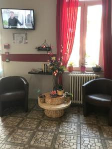 Hotels Au Royal Hotel : photos des chambres