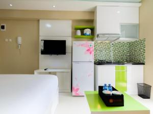 Modern and Minimalist Studio Bassura City Apartment By Travelio