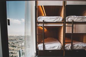 Single Bed in 16-Bed Dormitory Room room in Самый высокий отель в Европе с лучшим видом на Москву - Say Wow Capsule Hotel