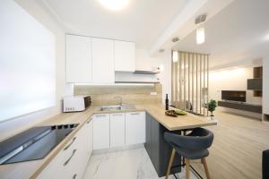 SeNs Apartments by Belmont Realty