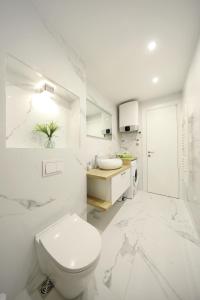 SeNs Apartments by Belmont Realty