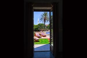 Senior Suite with Private Garden and Outdoor Hot tub (Views of Rhodes)