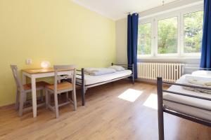 Quadruple Room with Shared Bathroom room in Patio Hostel