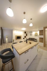 SeNs Apartments by Belmont Realty