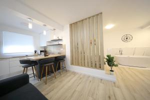 SeNs Apartments by Belmont Realty