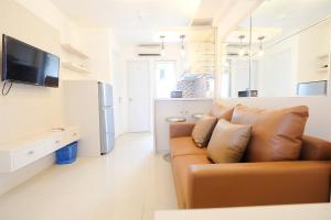 2BR Bassura City Apartment with City View By Travelio