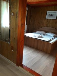 Two-Bedroom Suite room in Pensiunea Trei Ponei