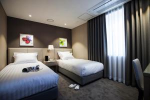 Phòng Tiêu Chuẩn 2 Giường Đơn – Không Gồm Chỗ Đỗ Xe (Standard Twin Room - No Parking Included)