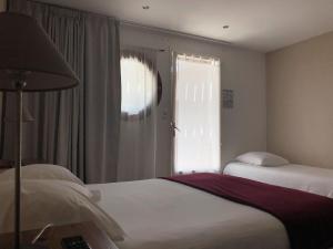 Hotels Le Pavillon Bleu : photos des chambres
