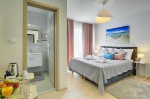 Standard Double Room with Balcony room in D&A Amphitheatre Apartments
