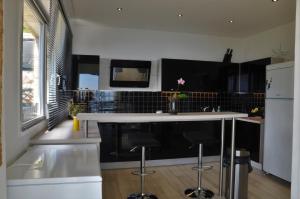 Appartements SKYLINE Apartments : photos des chambres