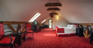 Family Suite - Attic room in Hotel Central Park Sighisoara
