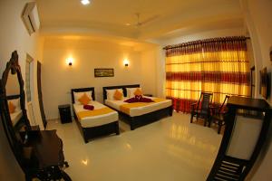 Queens Gate, Mirissa