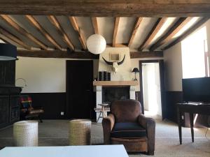 Maisons de vacances Holiday Home in Saint Laurent des Mortiers with Garden : photos des chambres