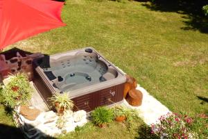 Maisons de vacances Gite l'Oree du bois - maison individuelle avec jacuzzi prive : photos des chambres